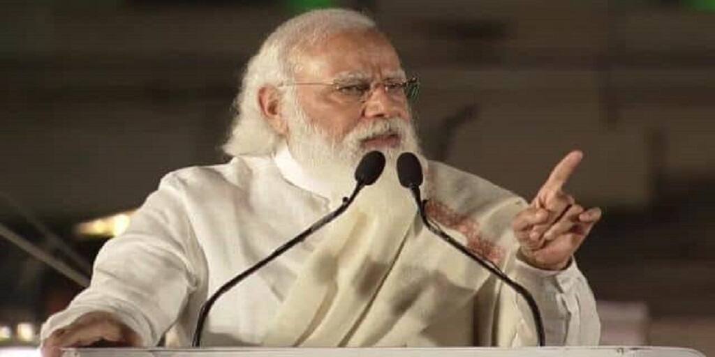 West Bengal Assembly Elections 2021 PM Narendra Modi recalls when he wished Mamata in Bengali she replied in Gujarati WB Election 2021: 'বাংলা ভাষায় মমতাকে শুভেচ্ছা জানিয়েছিলাম, উনি জবাব দিয়েছিলেন গুজরাতিতে', জনসভায় মোদি