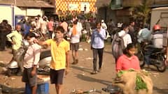 Dadar residents pull up masks as they see ABP News camera