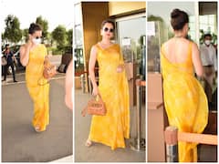 IN PICS: Kangana Ranaut Nails Her Airport Look In A Bright Yellow Saree!