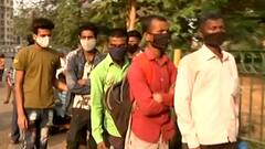 Migrant workers head home in large numbers as rising COVID cases impact work