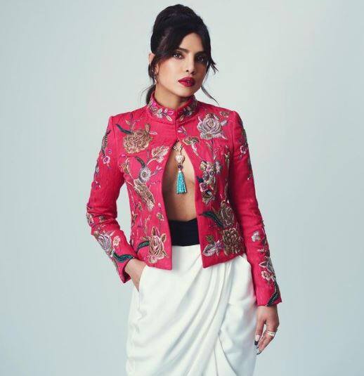 Priyanka put on a daring display with her statement red jacket covered with gold embroidery, the open front of which offered a glimpse of her ample cleavage.[pic credit: Instagram/Priyanka Chopra]