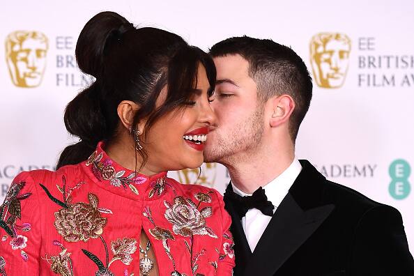 The couple shared plenty of loved-up moments before heading to the main event. [pic credit: Gettyimages]