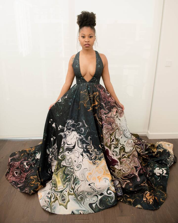 Dominique Fishback posing at BAFTA 2021