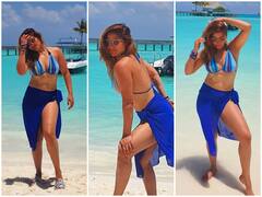 मालदीव पहुंचीं हैं एक्ट्रेस  Arti Singh, ब्लू बिकिनी में दिखाया सेक्सी अवतार, देखें तस्वीरें