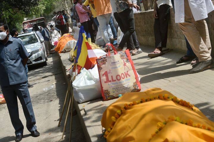 Uttar Pradesh is witnessing a space crunch in crematoriums and Graveyards amid huge spike in Covid deaths. People have been witnessing a long waiting period as the crematorium is filled with dead bodies of Covid victims. (Image: PTI)