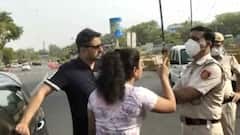 Delhi Couple: স্বামীকে চুমু খাব, পারবেন আটকাতে? দিল্লির রাস্তায় মাস্ক পরতে বলায় পুলিশের দিকে তেড়ে গেলেন দম্পতি