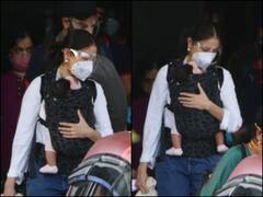 PICS: Anushka Sharma Holds Baby Girl Vamika Closely In Arms As She Arrives In Mumbai With Hubby Virat Kohli For IPL