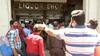 People throng liquor shops amid fear of complete lockdown | Ground Report