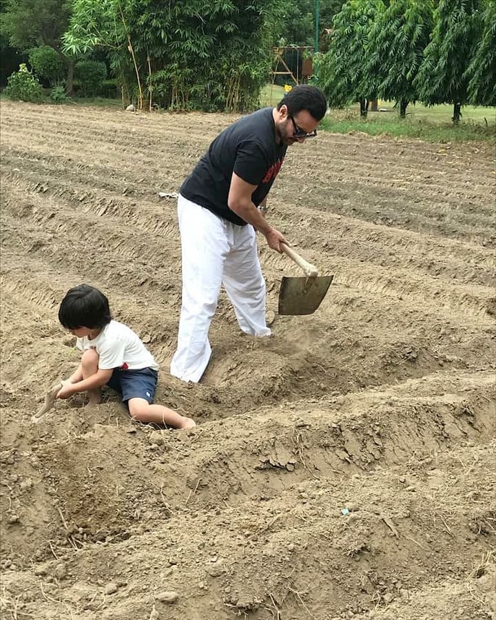 Kareena Kapoor shared a post wherein Taimur Ali Khan can be seen working on a field with his father Saif Ali Khan. While sharing, Bebo wrote, “Plant more trees ❤️ This world earth day... preserve ❤️ plant ❤️ Grow ❤️ #WorldEarthDay #FavouriteBoys”. (Image courtesy - @kareenakapoorkhan/Instagram)
