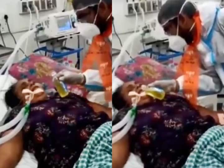 BJP Surat Leader Tweets Video Of Man Allegedly Feeding 'Gau Mutra' To Coronavirus Covid-19 Patient, Deletes Later BJP Surat Leader Tweets Video Of Man Allegedly Feeding 'Gau Mutra' To Covid Patient, Deletes Later