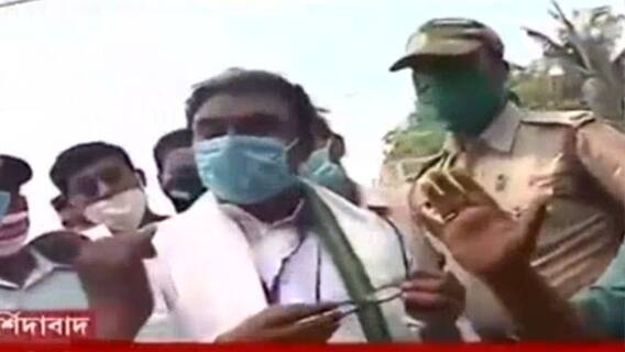 West Bengal Election 2021: মুর্শিদাবাদে মাস্কের মধ্যে 'টাকা বিলি'! 'করোনা থেকে বাঁচতেই মাস্ক দিয়েছি', সাফাই কংগ্রেস প্রার্থীর