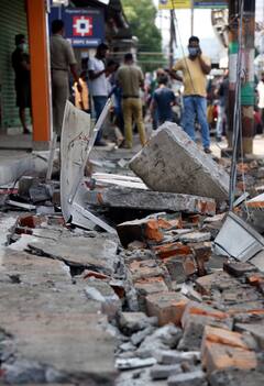 IN PICS | Assam Earthquake: Cracked Roads, Tilted Buildings - Tremors Lead To Heavy Damage