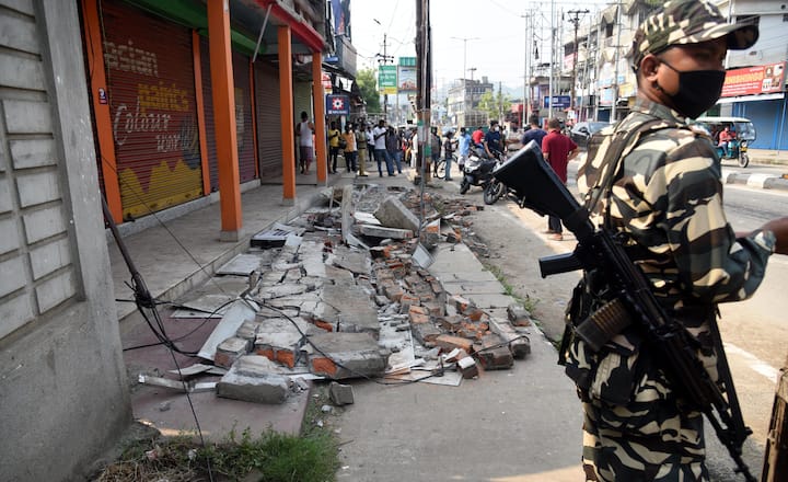 CRPF personnel were deployed near an earthquake-damaged building at Bhetapara in Guwahati. (Image: PTI)