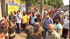 COVID-19 Vaccination : नेस्को लसीकरण केंद्राबाहेर नागरिकांची तुफान गर्दी; अर्धा किलोमीटर लांब रांगा