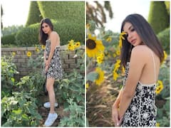 बैकलेस ड्रेस पहनकर Mouni Roy ने दिए फूलों के साथ जबरदस्त पोज, वायरल हुई फोटोज