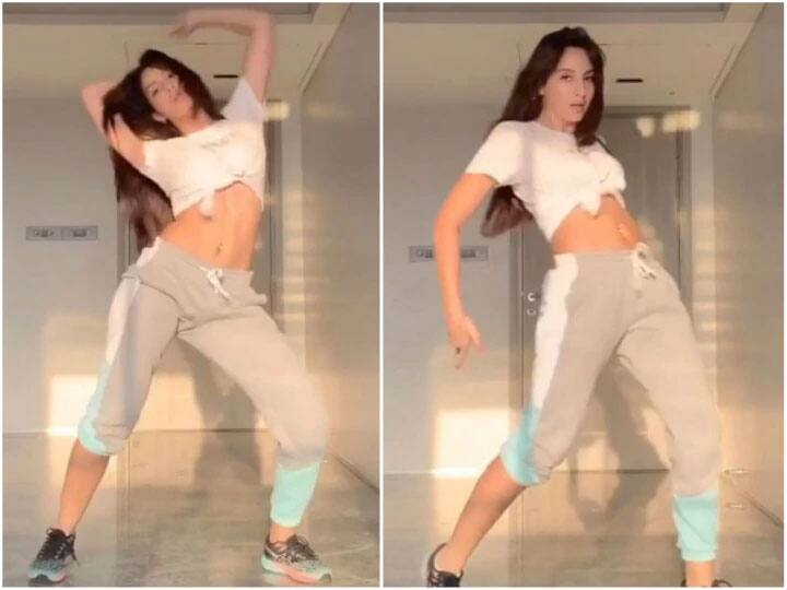 Nora Fatehi did a wonderful dance with holding a brush and remote you would not be able to stop laughing after seeing her co dancer कभी हाथ में ब्रश, कभी रिमोट लेकर Nora Fatehi ने किया अजब-गजब डांस, हंसी नहीं रोक पाएंगे आप