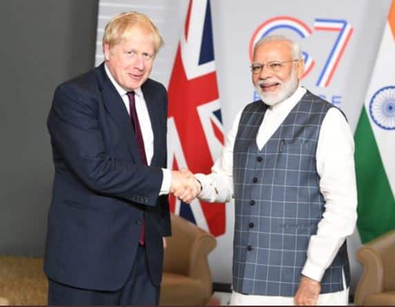 UK Parliament Witnesses Clash Over By-Election Leaflet Showing PM Johnson-Modi Handshake UK Parliament Witnesses Clash Over By-Election Leaflet Showing PM Boris - Modi Handshake Photo