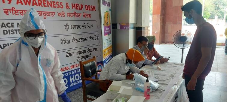 RAT Corona test at Amritsar Railway station ਰੇਲ 'ਚੋਂ ਉੱਤਰਿਆਂ ਹੋ ਰਿਹਾ ਕੋਰੋਨਾ ਟੈਸਟ, ਕਿਤੇ ਜਾਣ ਤੋਂ ਪਹਿਲਾਂ ਵੀ ਨੈਗੇਟਿਵ ਹੋਣਾ ਲਾਜ਼ਮੀ 