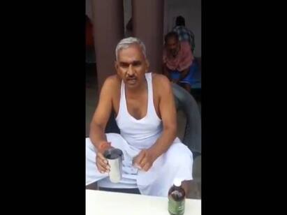 Drink cow urine daily on empty stomach says UP BJP MLA Surendra Singh ”பசு கோமியம் குடித்தால் கொரோனாவை தடுக்கலாம்” - குடித்து டெமோ காட்டிய பாஜக எம்.எல்.ஏ..