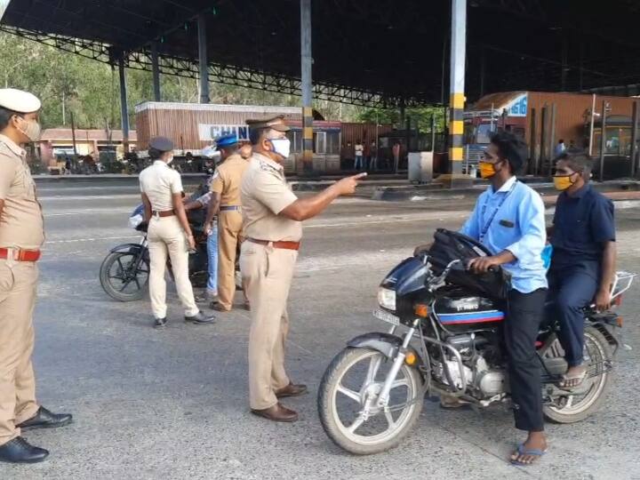 ஊரடங்கை மீறி உலா வந்த வாகனங்களை எச்சரித்து அனுப்பும் போலீசார்