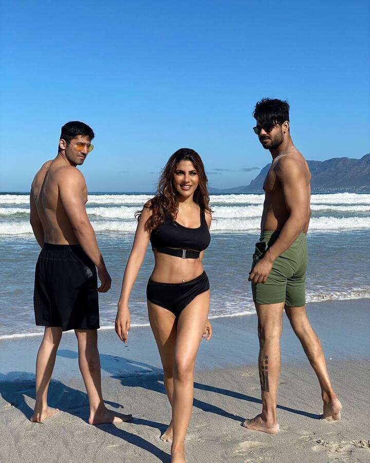 Nikki Tamboli, who is currently busy shooting for 'Khatron Ke Khiladi 11', has set the internet on fire with her new photos. The actress posted a stunning photo from the beach with her 'Desi boys' on social media along with the caption, 