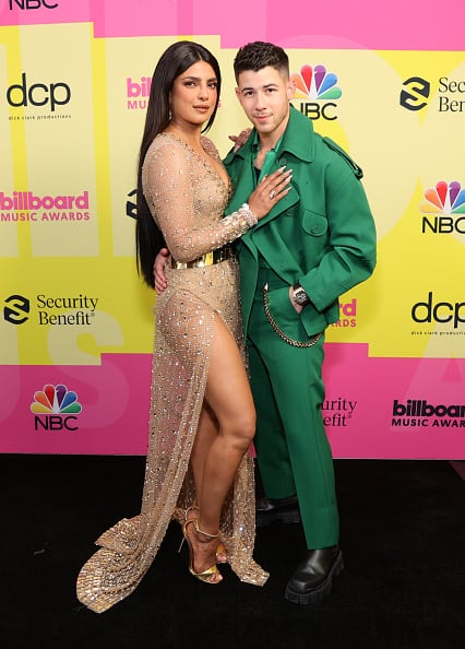 Nick Jonas, who recently had a bike accident, hosted the Billboard Music Awards in Los Angeles on Sunday night and Priyanka Chopra, was one of the presenters at the music awards. [pic credit: Gettyimages]