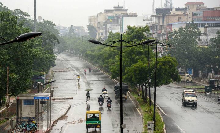 Bhubaneswar: Vehicles ply during rain triggered by Cyclone Yaas. (Image: PTI)