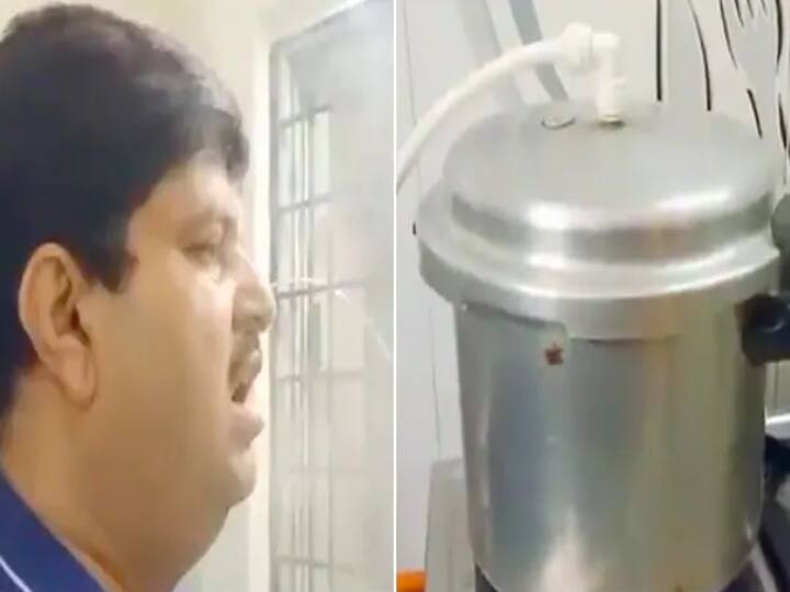 Man uses pressure cooker for steam Inhale people says its dangerous குக்கர் ட்யூபில் நீராவிபிடித்த நபர் : என்னென்ன செய்றான் பாருங்க? என கலாய்க்கும் நெட்டிசன்கள்