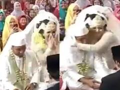 ''ஐ.. கல்யாணம் ஆகிட்டு..'' மகிழ்ச்சியில் துள்ளிக்குதித்து மணமகனை முத்தமிட்ட மணமகள்!