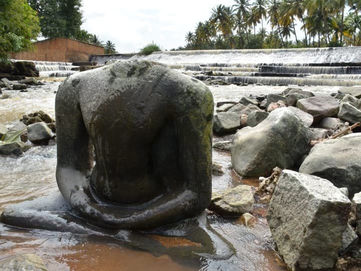 Headless Buddha statue found in Mullai Periyar A ruined temple with evidence of the existence of Buddhism TNN தேனி முல்லைப் பெரியாற்றில் தலையில்லாத  புத்தர் சிலை - பெளத்த சமயம் இருந்ததற்கான ஆதாரம் இதோ