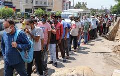 IN PICS | Covid Norms Go For Toss, People Line Up Outside Liquor Shops, Temples As States 'Unlock'