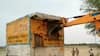 Aligarh Police demolishes illegal liquor shop