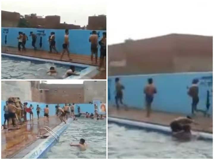 Dozens of people found bathing in swimming pool despite corona curfew in Ghaziabad गाजियाबाद में कोरोना कर्फ्यू के बावजूद स्विमिंग पूल में नहाते पाए गए दर्जनों लोग, मालिक के खिलाफ मामला दर्ज