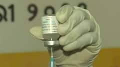 How will India achieve the target of vaccinating over 200 crore people by year end?