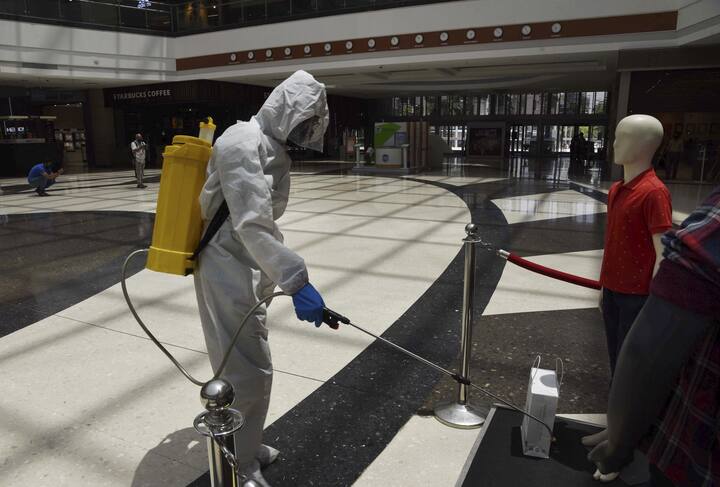 Ahead of the reopening the city, workers could be sanitizing various places like malls and salons. Preparing for the week ahead. (Image Source: PTI)