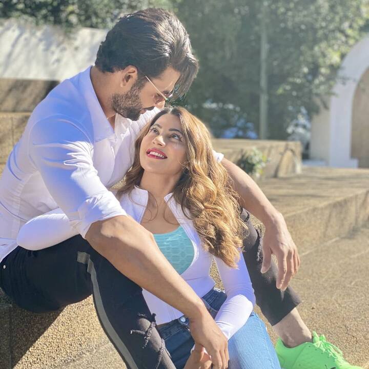 Vishal Singh and Nikki Tamboli couldn't take their eyes off each other while striking a pose for the camera.