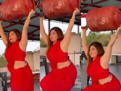 Viral video: लाल साड़ी पहनकर गैस सिलिंडर उठाकर वर्कआउट करतीं नजर आईं Shelli Chikara
