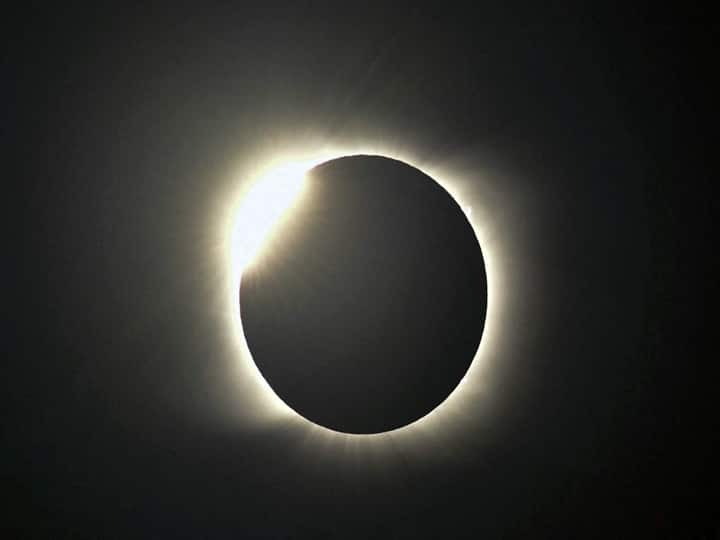 The diamond ring effect is seen during the total solar eclipse from Villa Chocon, Neuquen province, Argentina on December 14, 2020. (RONALDO SCHEMIDT / AFP)