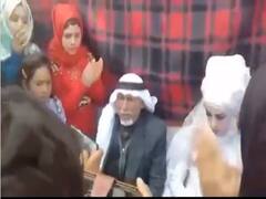 Viral: 37वीं बार दूल्हा बने शख्स ने अपने 126 पोते-पोतियों के सामने रचाई शादी, वीडियो देख हैरान हुए यूजर्स