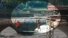 Stranded labourers rescued from a swollen river in Sagar