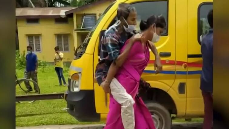 Niharika Piggybacks Covid Positive Father-In-Law In An Act Of Desperation In Assam Assam Woman Piggybacks Covid Positive Father-In-Law In Desperate Bid To Save His Life