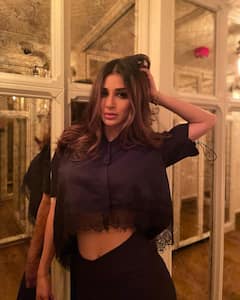 IN PICS | ‘Brahmastra’ Actress Mouni Roy Dazzles In Black Crop Shirt And Maxi Skirt
