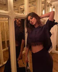 IN PICS | ‘Brahmastra’ Actress Mouni Roy Dazzles In Black Crop Shirt And Maxi Skirt