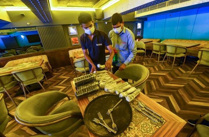 Restaurants will be allowed to open at 50% seating capacity in Delhi. This system will be followed for a week and in case the cases increase, stricter restrictions to be imposed. (Image: PTI)