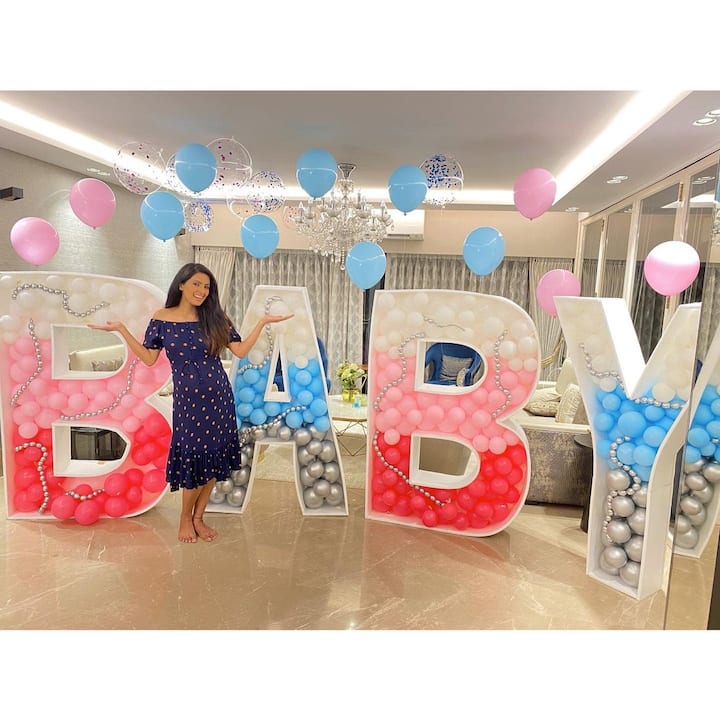 Bollywood actress Geta Basra, who is also the wife of Indian cricketer Harbhajan Singh is all set to welcome her second child this July. Geeta shared the happy news of her pregnancy with a family picture on social media. (Image courtesy - @geetabasra/Instagram)