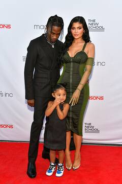IN PICS: Kylie Jenner Looks Like A Green Goddess Posing With Travis Scott & Their Daughter Stormi At An Event