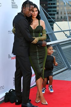 IN PICS: Kylie Jenner Looks Like A Green Goddess Posing With Travis Scott & Their Daughter Stormi At An Event