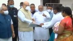 કેન્દ્રીય ગૃહમંત્રી શાહ પહોંચ્યા રૂપાલ, વેક્સિનેશન સેન્ટરની મુલાકાત સાથે કર્યું વૃક્ષારોપણ