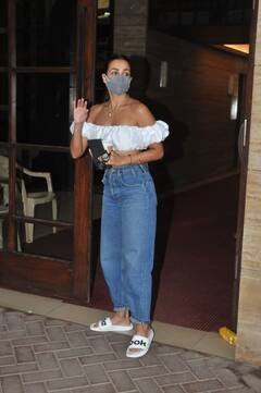 IN PICS: Malaika Arora’s Style Game Is On Point As She Steps Out In A Baggy Mom Jeans & Skimpy White Crop Top