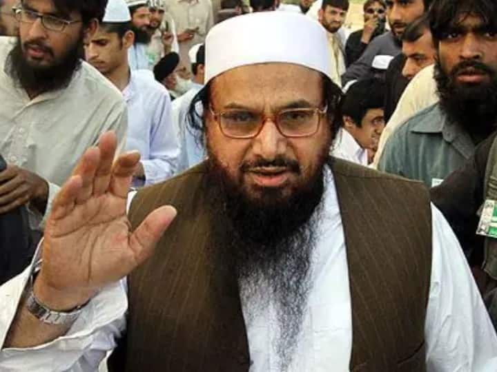 Pakistan Lahore Johar Town area  Blast Mumbai Attacks Mastermind Bomb Blast outside Hafiz Saeed House Pakistan Bomb Blast:পাকিস্তানে জঙ্গি হাফিজ সইদের বাড়ির সামনে জোরাল বিস্ফোরণ, মৃত ২, আহত ১৫